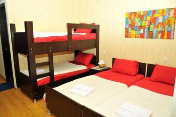 Фото номера Стандартный четырехместный номер Отель Alma-Ata Hotel г. Боржоми 4