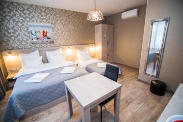 Фото номера Улучшенный двухместный номер с 1 кроватью Отель Milano Palace Borjomi г. Боржоми 4