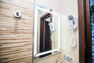 Фото номера Улучшенный трехместный номер Отель Milano Palace Borjomi г. Боржоми 2