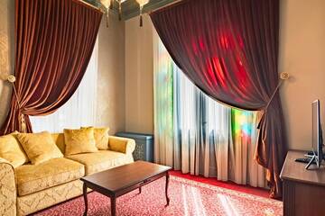 Фото номера Люкс с видом на горы Отель Golden Tulip Borjomi г. Боржоми 2