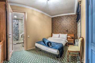 Фото номера Одноместный номер Отель Golden Tulip Borjomi г. Боржоми 3