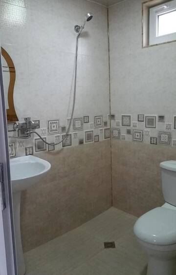 Фото номера Двухместный номер с 2 отдельными кроватями и балконом Гостевой дом Irakli Guesthouse г. Боржоми 24