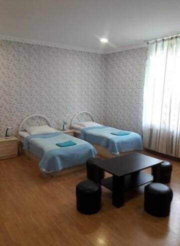Фото номера Классический четырехместный номер Отель Guesthouse Texell г. Боржоми 7