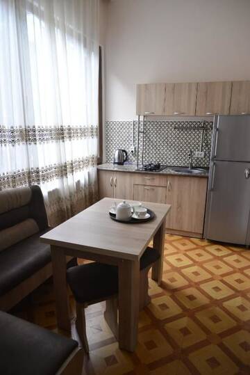 Фото номера Улучшенный двухместный номер с 1 кроватью Отель Hotel Victoria г. Боржоми 3
