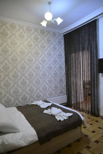Фото номера Улучшенный двухместный номер с 1 кроватью Отель Hotel Victoria г. Боржоми 2