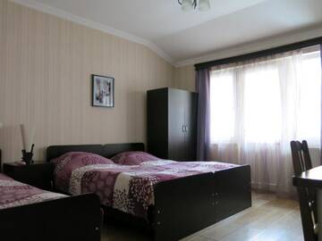 Фото номера Трехместный номер с балконом Мини-отель Nick&amp;David INN г. Боржоми 3
