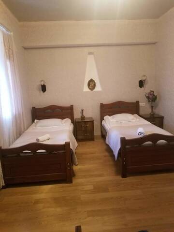 Фото номера Трехместный номер Гостевой дом Guest House Shvelidze г. Боржоми 6
