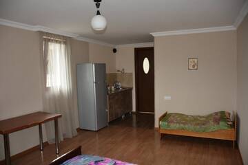 Фото номера Семейный номер с ванной комнатой Гостевой дом Guesthouse Dolche г. Боржоми 5