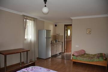 Фото номера Семейный номер с ванной комнатой Гостевой дом Guesthouse Dolche г. Боржоми 3