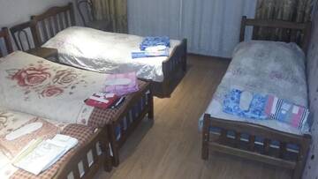 Фото номера Четырехместный номер с видом на горы Гостевой дом Guesthouse Malkhaz г. Боржоми 4