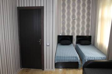 Фото номера Классический четырехместный номер Гостевой дом Guest House Mindia г. Боржоми 19