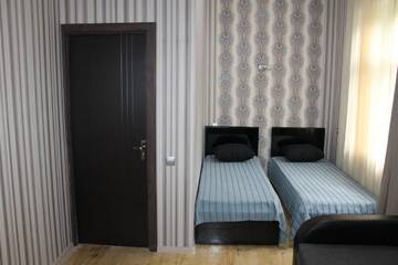 Фото номера Классический четырехместный номер Гостевой дом Guest House Mindia г. Боржоми 7