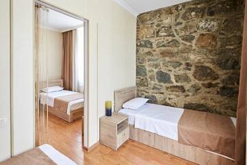 Фото номера Стандартный семейный номер Отель Hotel Old Borjomi г. Боржоми 8