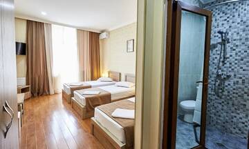 Фото номера Стандартный трехместный номер Отель Hotel Old Borjomi г. Боржоми 8