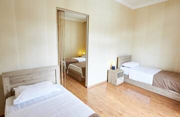 Фото номера Стандартный семейный номер Отель Hotel Old Borjomi г. Боржоми 11