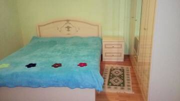 Фото номера Трехместный номер с балконом Гостевой дом Guesthouse Megi on Robaqidze 6 г. Боржоми 4