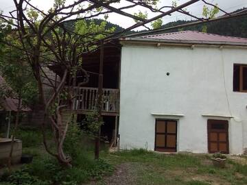 Фото номера Трехместный номер с балконом Гостевой дом Guesthouse Megi on Robaqidze 6 г. Боржоми 11