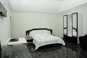 Фото номера Четырехместный номер &quot;Комфорт&quot; Гостевой дом HOTEL Tacho г. Боржоми 4