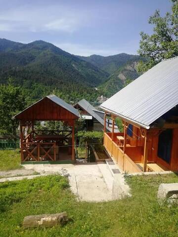 Фото номера Трехместный номер с видом на горы Лоджи Guest House Ilia г. Боржоми 7