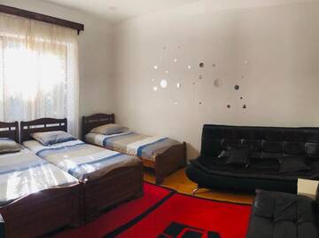 Фото номера Бюджетный трехместный номер Гостевой дом GuestHouse Greenside г. Боржоми 3