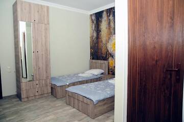 Фото номера Двухместный номер с 2 отдельными кроватями Гостевой дом nimako г. Боржоми 19