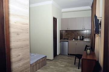 Фото номера Двухместный номер с 2 отдельными кроватями Гостевой дом nimako г. Боржоми 4