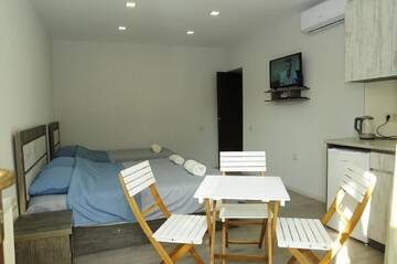 Фото номера Апартаменты-студио Апарт-отели Borjomi Apartments Apart Hotel г. Боржоми 17
