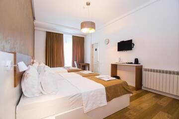 Фото номера Классический четырехместный номер Отель Rustaveli Borjomi Hotel г. Боржоми 16