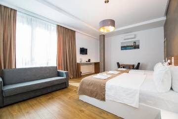 Фото номера Четырехместный номер Делюкс Отель Rustaveli Borjomi Hotel г. Боржоми 9